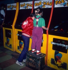 Young girls are photographed June 1, 1982 playing Pac-Man at a video arcade in Times Square, New York City. (Photo by Yvonne Hemsey/Getty Images)